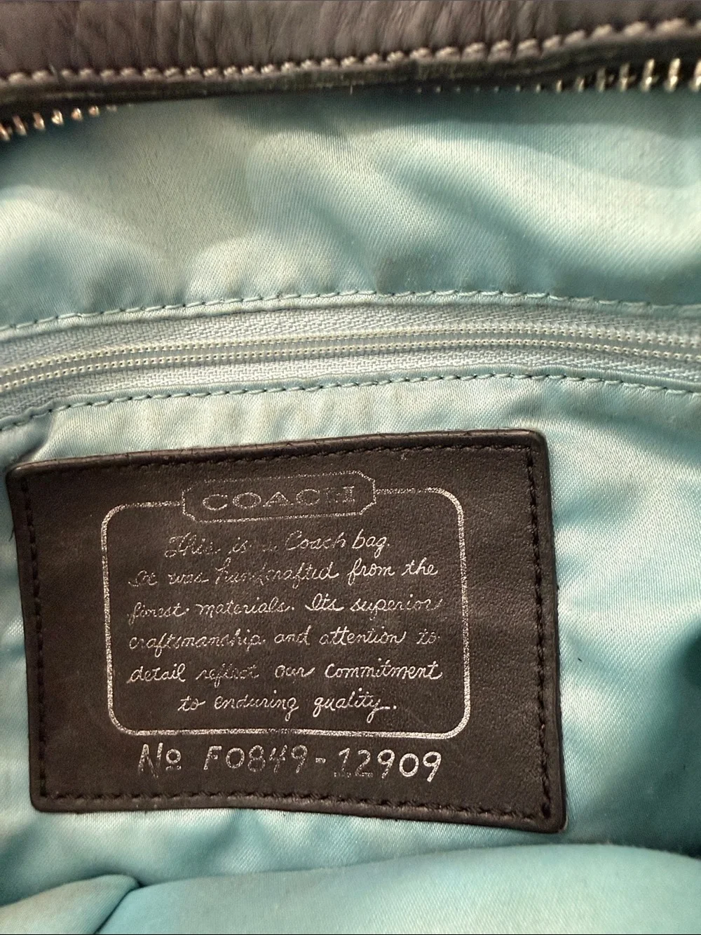 Coach black signature